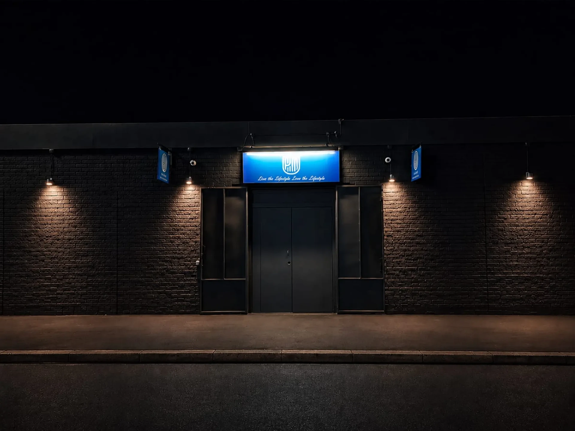 The discreet entrance to PDI Lifestyle Birmingham at night
